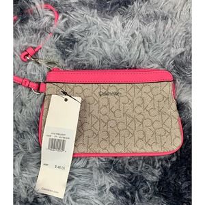 Pink and gray Calvin Klein wristlet